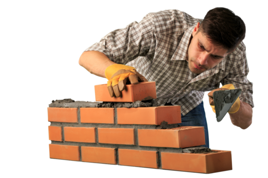 Man worker installing brick masonry wall with a trowel