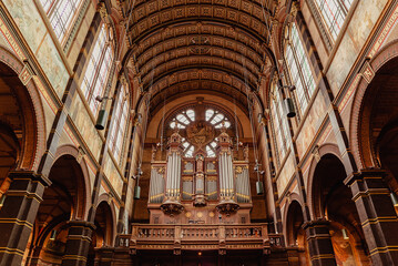 Fototapeta na wymiar The Saint Nicholas Basilica is the primary roman catholic church in Amsterdam downtown.