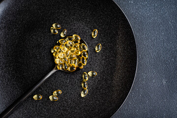 Healthy living concept with oily vitamin medicines