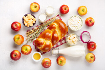 Fototapeta na wymiar Jewish Shavuot Holiday Card. Dairy Products, Apples, Cheese, Bread, Milk on White Background.