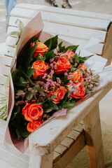 Bouquet of flowers with orange roses