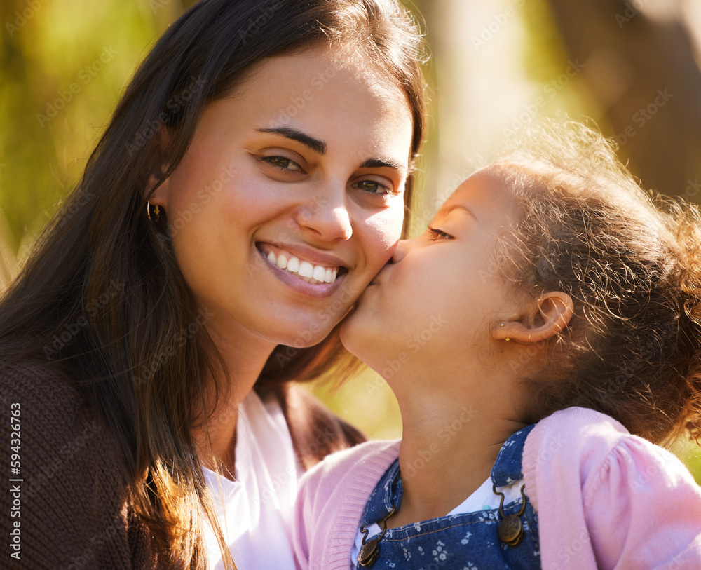 Wall mural Isnt she lovely. an attractive young woman and her daughter sharing an intimate moment during their picnic in the park.