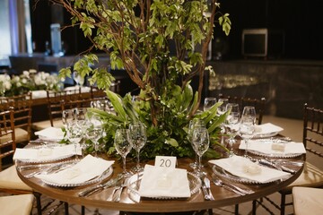 Interior of a restaurant decorated with flowers for a wedding celebration ceremony