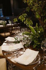 Interior of a restaurant decorated with flowers for a wedding celebration ceremony