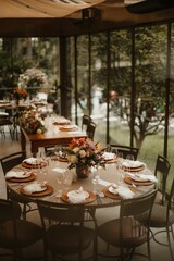 Interior of a restaurant decorated with flowers for a wedding celebration ceremony