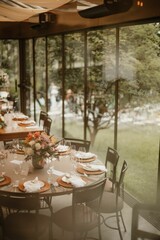 Interior of a restaurant decorated with flowers for a wedding celebration ceremony