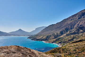 A photo of mountains, coast and ocean from Shapmanns Peak,. A photo mountains, coast and ocean from Shapmanns Peak, with Hout Bay in the background. Close to Cape Town.