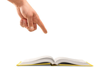 Opened book with business concept icons and hand making choice