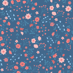 Nostalgic retro groovy colorful flower seamless pattern on blue background