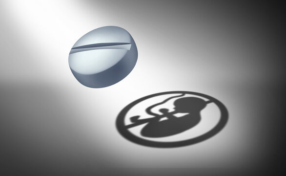 Abortion Pill Concept or oral contraceptive medication as an anti reproductive medicine to prevent pregnancy  or birth control or as a social issue for reproduction justice