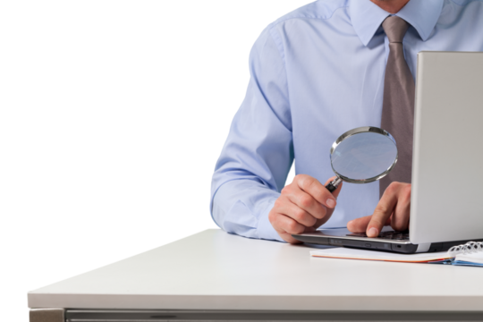 Businessman with Magnifying Glass checking the numbers - Powered by Adobe