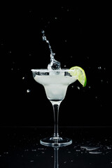 Margarita cocktail garnished with lime.