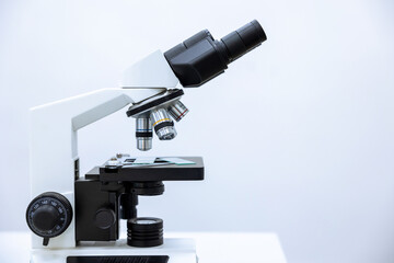 Image of microscope, chemistry, pharmaceutical instrument, microbiology magnifying tool. Copy space.