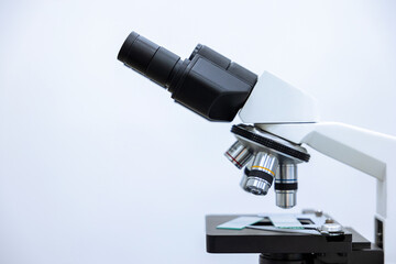 Image of microscope, chemistry, pharmaceutical instrument, microbiology magnifying tool. Copy space.
