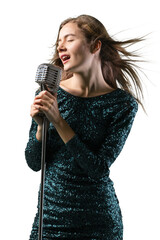 Beautiful young female singer with vintage microphone