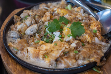 Hot Plate Thai Oyster Omelette with Crispy Egg and Cilantro