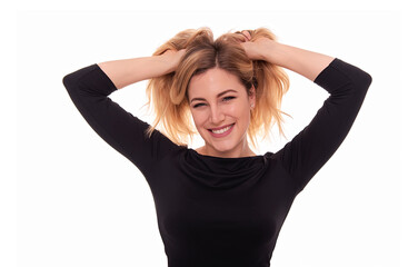 Beautiful blonde woman in a dark blouse on a white background.