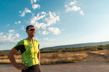 A triathlete resting after a hard morning's run. Training preparation for the upcoming marathon