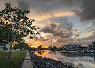 Picturesque scene of an urban area of Queensland, Australia at sunset, taken from the edge of river