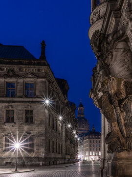 Cityscape of Dresden through the Augustus street to the woman church at the blue hour