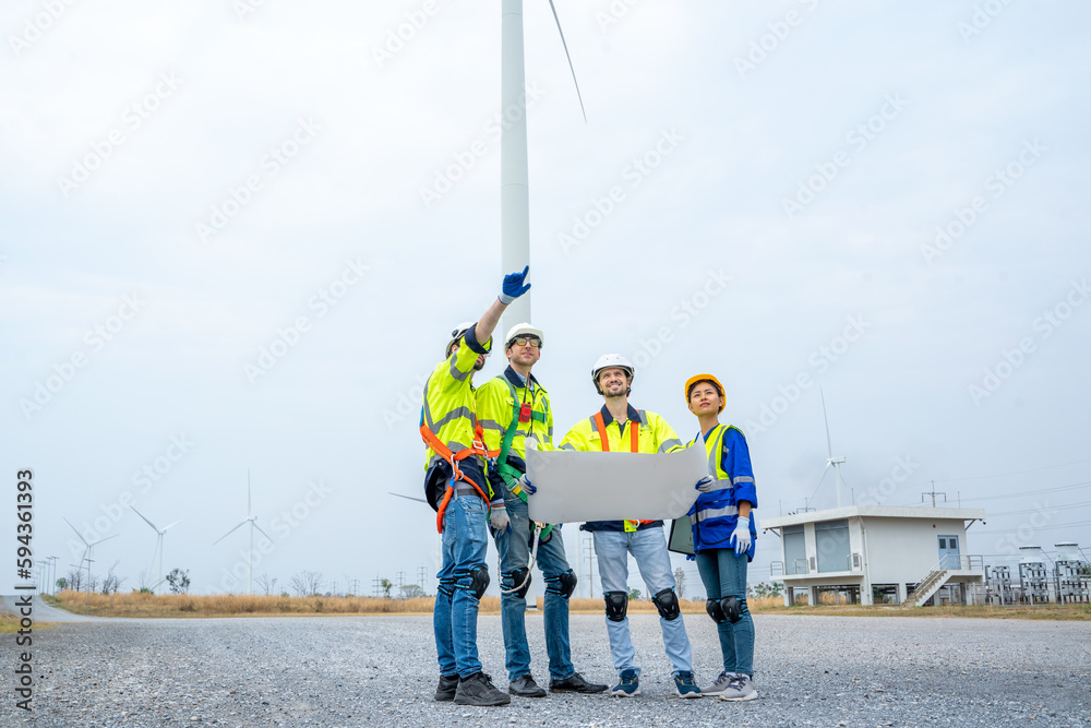 Poster group of engineers are working with a blueprint in wind turbine farm,wind power station,renewable an
