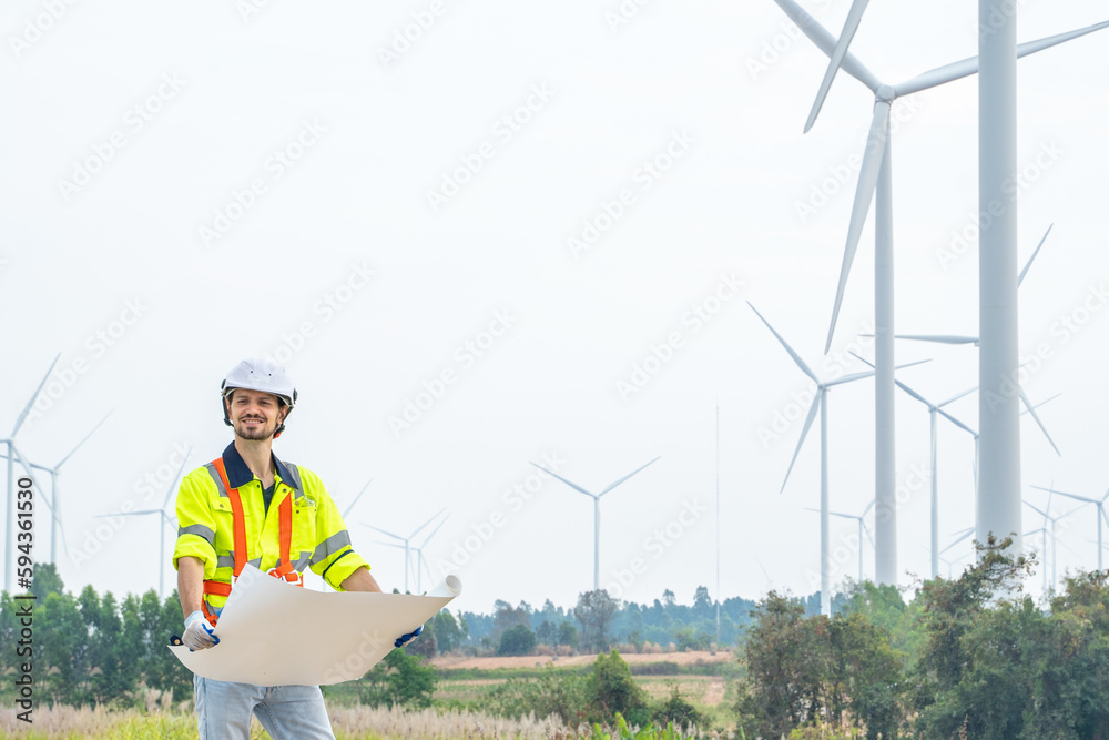 Poster engineer inspection and survey work in wind turbine farms rotation to generate electricity energy.