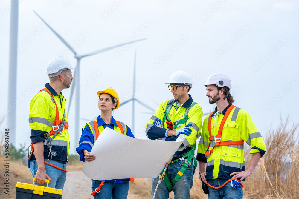 Poster engineer working at renewable energy farm,inspector controlling functioning of wind turbines outdoor