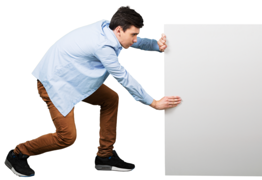 young man supporting a blank banner with both hands while crouching down