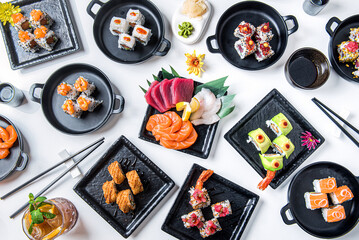 Sushi set on white background top view. Japanese food. Japanese cuisine.