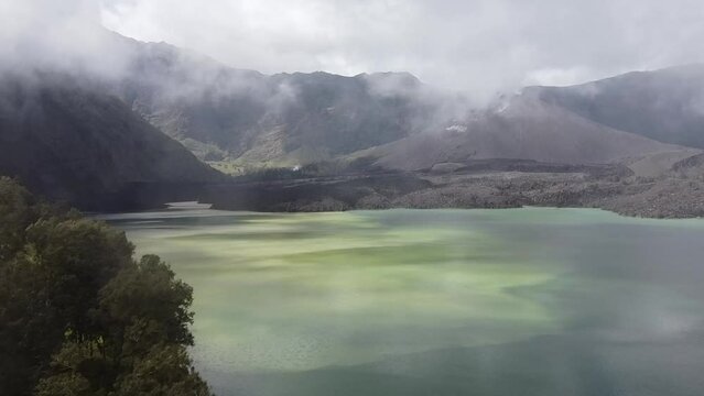 Danau Segara Anak is a volcanic or crater lake formed in the caldera of Mount Rinjani Lombok Islan on over 2,000 meters above sea level. 