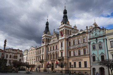 Fototapeta na wymiar Pardubice, Czech Republic - March 25, 2023 - the Town Hall in the Pernstejn Square one spring afternoon
