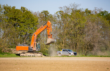 excavator at work in the forest