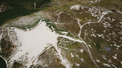 plants, slopes of sand dunes in summer in Ireland, top view. Beautiful Irish hills, landscape....