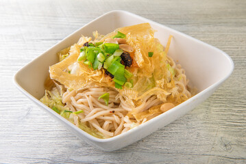 Rice Noodles with Chinese Beef on Plate served at table.