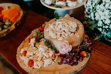 A closeup of a festive table with a variety of sweets and snacks served during the ceremony