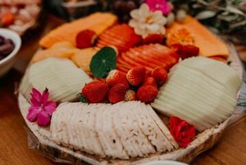 Selection of fresh, colorful fruit arranged on a plate in an inviting presentation