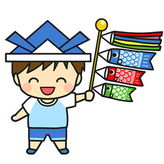 笑顔でこどもの日を楽しむ男の子とミニ鯉のぼり