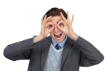 Hand, portrait and binocular gesture by businessman on isolated, transparent and png background. Hands, frame and corporate man being goofy, joke and comic, humor and silly faces, playful and glasses