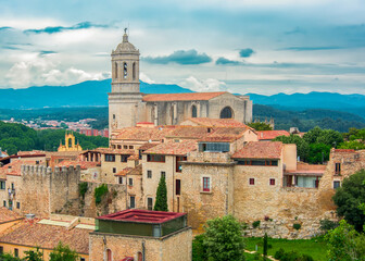 Fototapeta na wymiar Girona Cathedral over old town walls, Spain