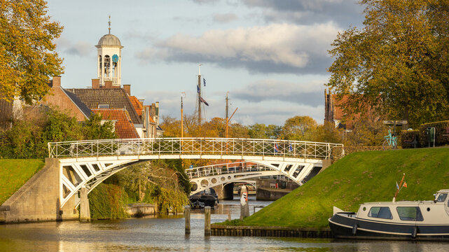 Historic place Dokkum with bridges in Friesland the Netherlands seen from the water