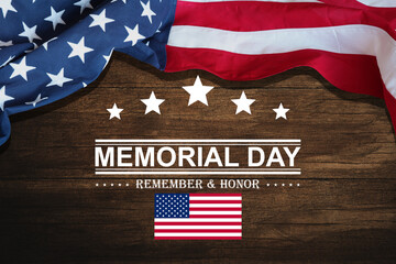 Fototapeta na wymiar Memorial Day background design. American flag on a background of wooden table with a message. Remember and Honor.