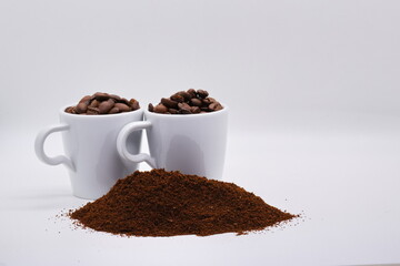 Close-up of coffee beans on white background