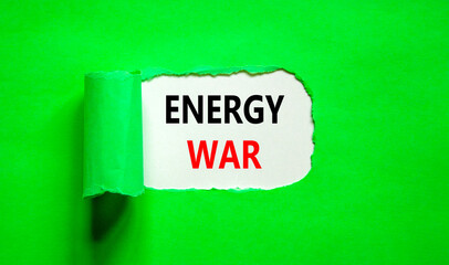 Energy war symbol. Concept words Energy war on beautiful white paper. Beautiful green table green background. Business and Energy war concept. Copy space.