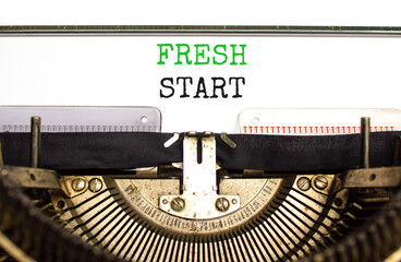 Fresh start and motivational symbol. Concept words Fresh start typed on beautiful old retro typewriter. Beautiful white background. Business motivational and Fresh start concept. Copy space.