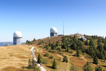 Mountain Großer Arber panorama with radar domes (radome) and summit cross and in Bavarian Forest,...
