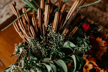 Fototapeta premium Closeup of floral decorations and bouquets on the table for a wedding celebration