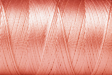 Texture of rose gold thread, closeup view