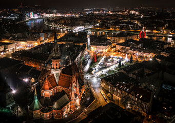 Aerial view of Podgorski Square with St. Joseph's Church and Christmas stalls at Christmas time in Krakow, Poland