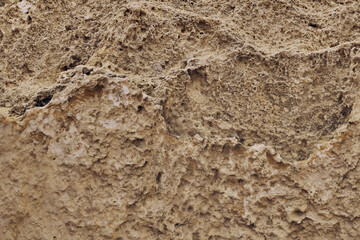 Abstract brown background of wrinkled uneven sand texture