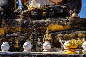 Close up of ancient and worn Buddhism statues in Wat Phiawat, Xiangkhouang, Laos